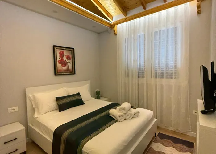 Reja Hamallaj 德拉克