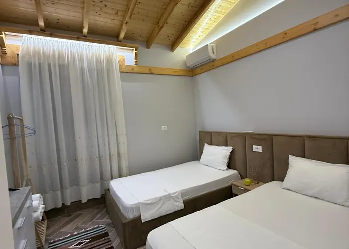 Reja Hamallaj 德拉克